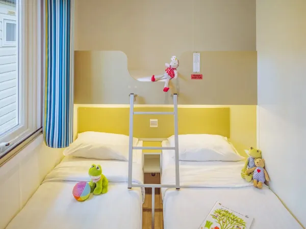 La deuxième chambre du salon Roan Comfort.