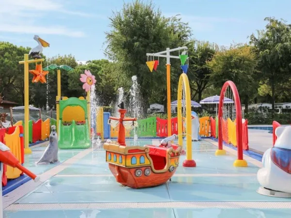 Aire de jeux pour enfants au camping Roan Sant Angelo.
