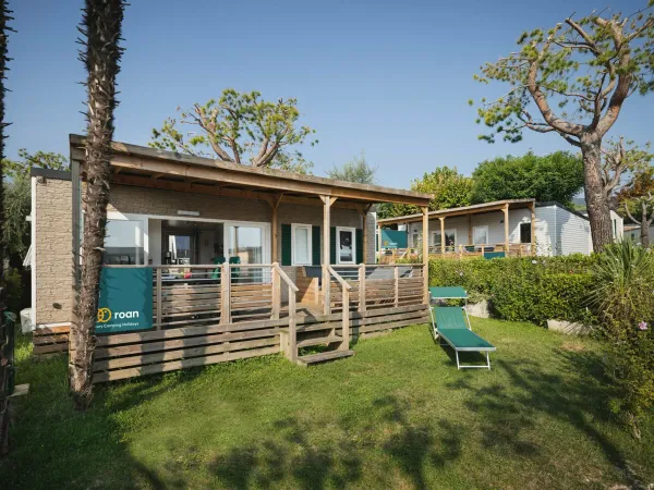 Salon Premium Plus au camping Roan Eden.