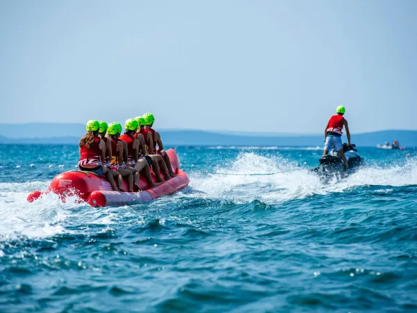 Banana boating at sea at Roan campsite Zaton Holiday resort.