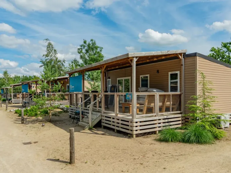 Le mobil-home Premium Lounge au camping Roan, dans le parc de vacances Ackersate.